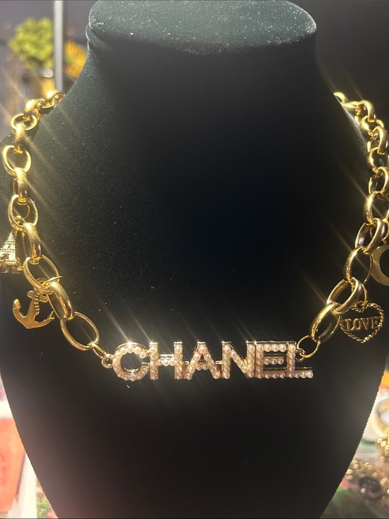 The Unbranded Brand Jewelry - Gold Crystal Logo Charm Necklace